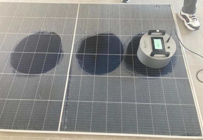 The Portable Soiling Sensor at the selected measurement locations on the module